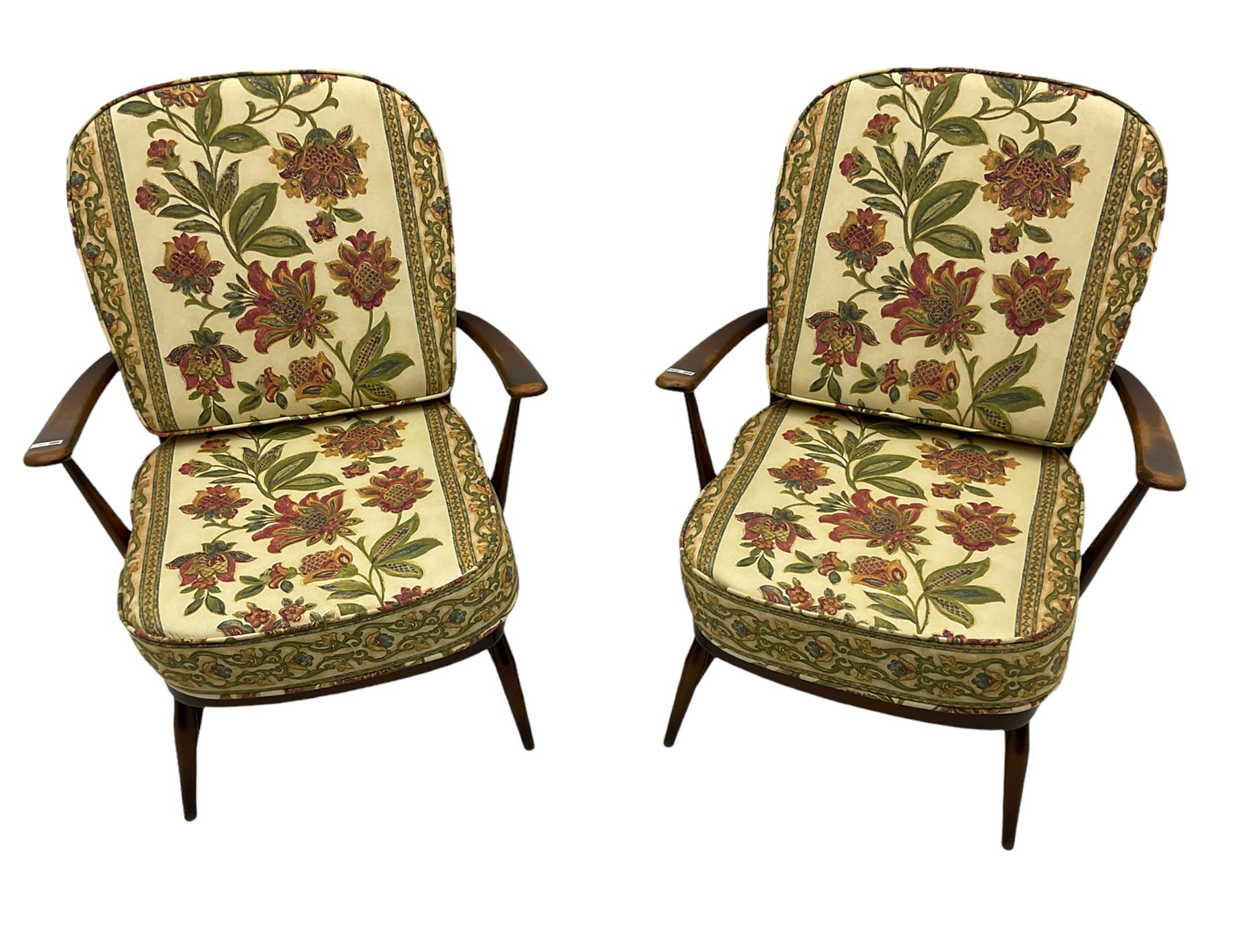 Ercol - Pair of mid-20th centur medium elm framed easy chairs, with loose patterned covers with folate design