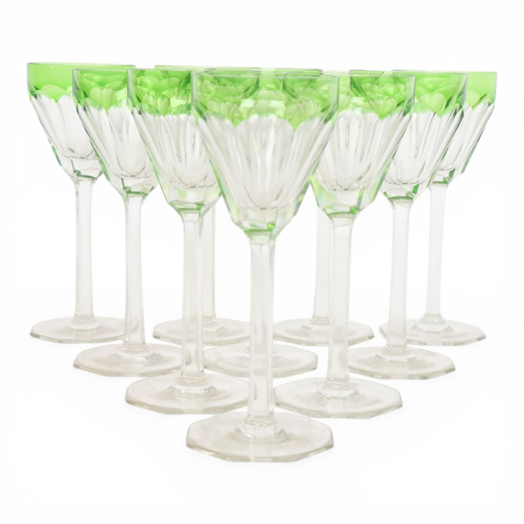 Set of ten wine glasses, of fluted form with chartreuse rim, upon a faceted stem, H20cm  