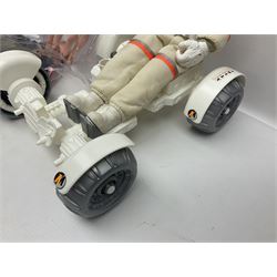 Action Man - large collection of 1960s and later figures and accessories including Spaceman with ATLRV vehicle; two figures marked 'Made in England by Palitoy under licence from Hasbro 1964'; twenty-five assorted weapons; radio backpacks; kit bags; twenty-one pairs of boots; football boots and snow shoes; metal diver's boots and three pairs of flippers; two pairs of jackboots; roller skates; various tunics, trousers, flying suits, jumpers, belts etc; twenty helmets, berets, busby, kepis, submariner etc; and quantity of other accessories