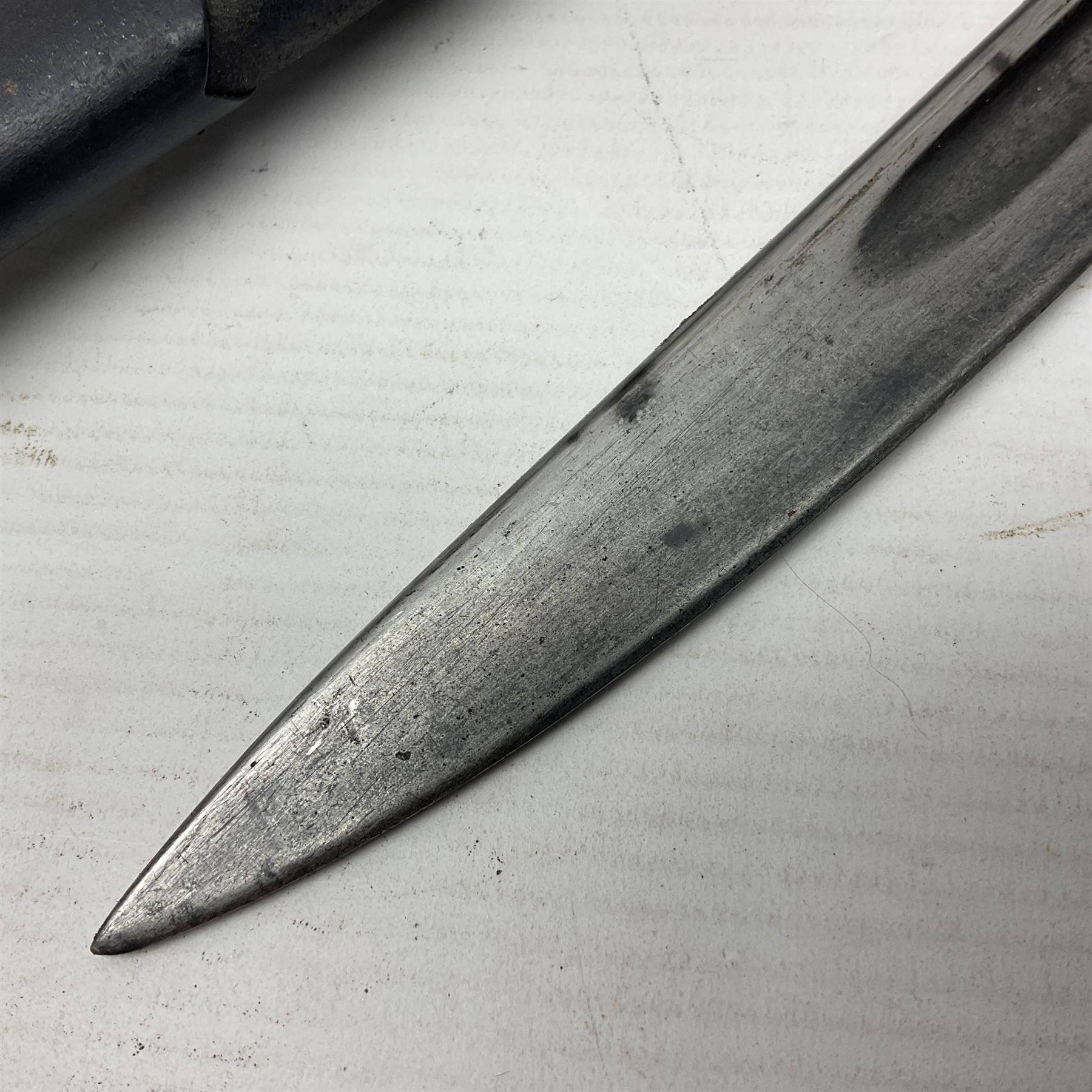 WWI British 1907 pattern bayonet, the 43cm fullered blade by Wilkinson with various marks to the ricasso; in leather covered scabbard numbered 294 to the throat and stamped M/58 L58.5cm overall