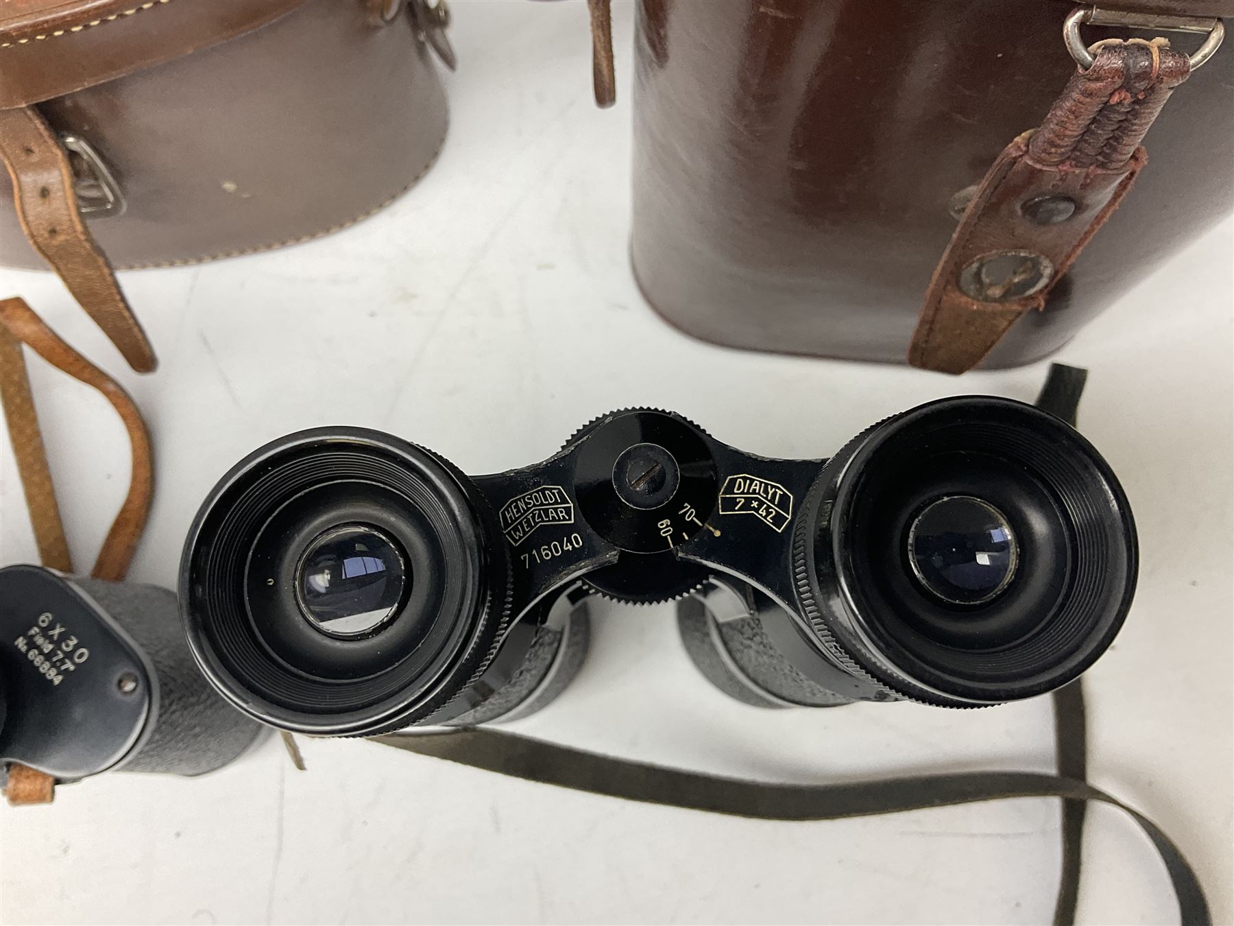 Eleven pairs of binoculars, to include Zeiss Wetzler 20x50, Taylor-Hobson Bino Prism No.2 Mk.III military stamped 1943 with broad arrow,  Swift Tecnar 16x50, J.T Coppock Oceanic Bloomed 10x50, Hensoldt Wetzlar Dialyt 7x42 etc
