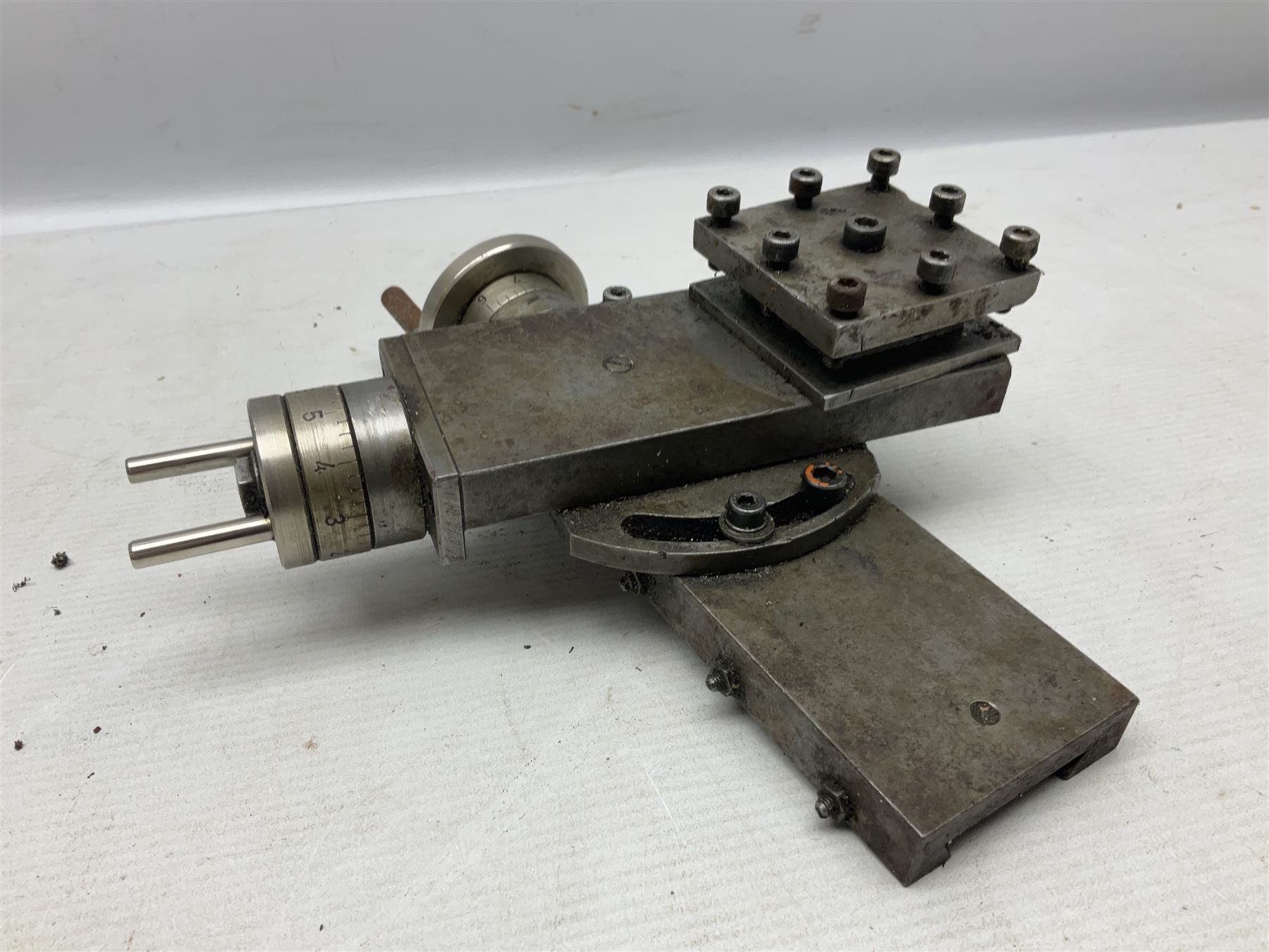 Cowells of Norwich model 90 modelmaker's lathe with handbook, the Pratt Bernard 4-jaw chuck with 4cm centre height and 7.5cm throw L44.5cm; together with an unrelated Hobbymat horizontal cross-slide with 4-way tool post (2)