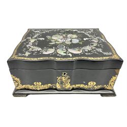 Victorian papier mâché box decorated throughout with gilt scrolls, the cover with hand painted floral spray surrounded with inlaid mother of pearl, L30cm D24 H13cm