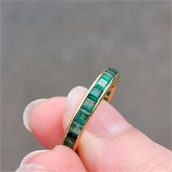 18ct gold emerald full eternity ring, channel set with calibre cut emeralds