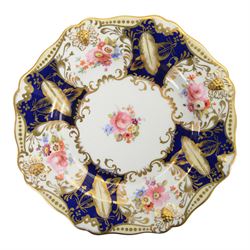 Collection of 19th century porcelain dessert wares, comprising Bloor Derby dish, circa 1825, Spode Felspar shaped oval dish, circa 1820, Ridgeway shaped oval footed dish with twin handles, circa 1840, Ridgeway dish, circa 1820, and tazza and dish, probably Minton, pattern 4810, each decorated in various patterns with floral sprays against dark blue grounds and heightened with gilt