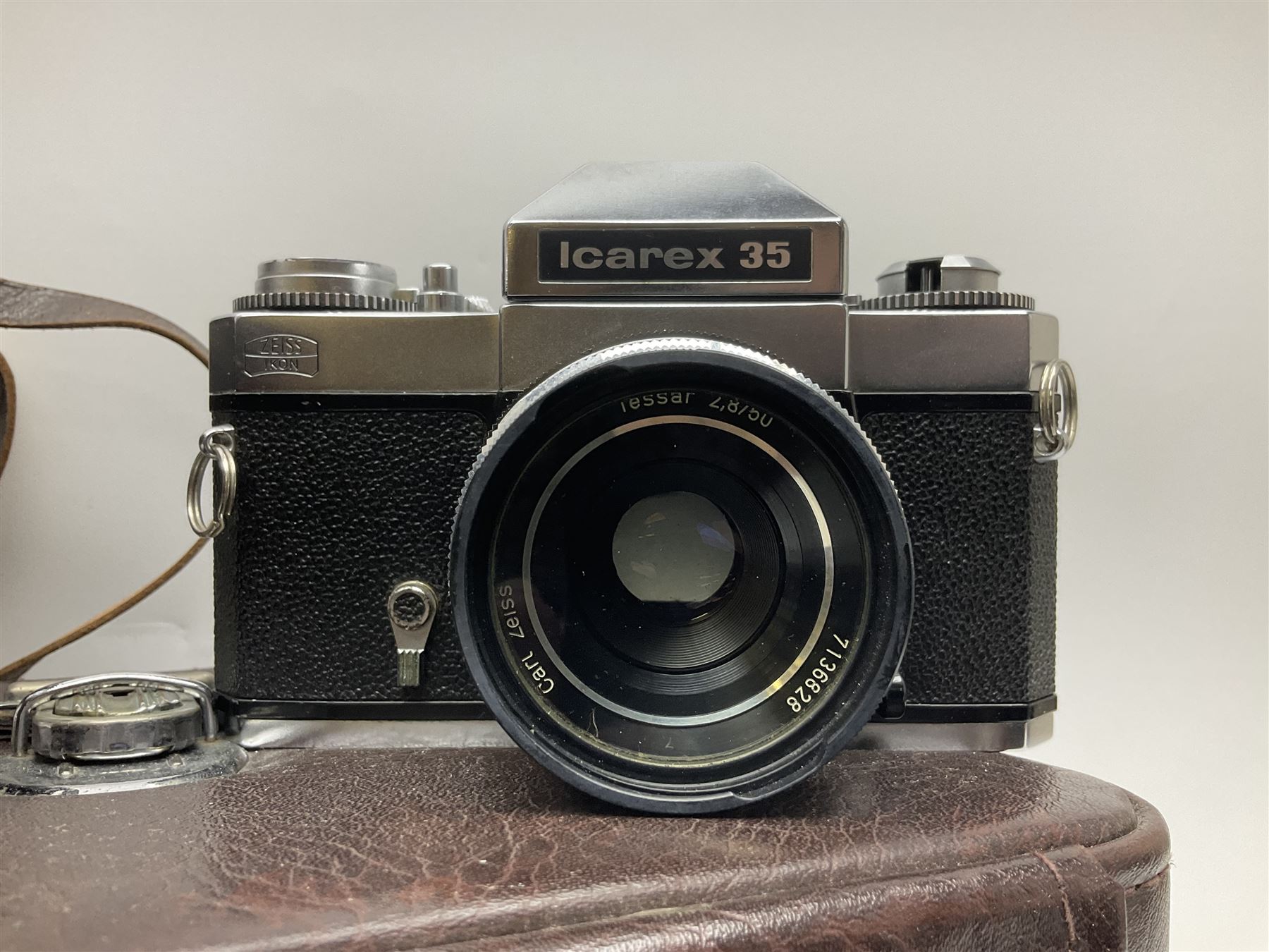 Four Zeiss Ikon camera bodies, to include, Contaflex Super B camera body, serial no. B31591, with 'Carl Zeiss Tessar 2.8/50 lens, serial no.3425553, Contaflex Super BC camera body, serial no. P81728, with 'Carl Zeiss Tessar 2.8/50' lens, serial no 4822280, etc, together with three cased lenses; 'Carl Zeiss Pro-Tessar 1:4 f=115mm' lens, serial no 3734740, 'Carl Zeiss Pr-Tessar 1:3.2 f=85mm' lens, serial no. 3647764 and 'Carl Zeiss Pr-Tessar 1:3.2 f=35mm' lens, and other Zeiss Ikon equipment 