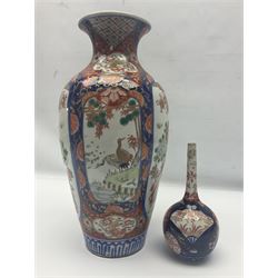 Large Imari vase of baluster form the panels depicting peacocks in a garden setting, together with a small imari vase, large vase H38cm