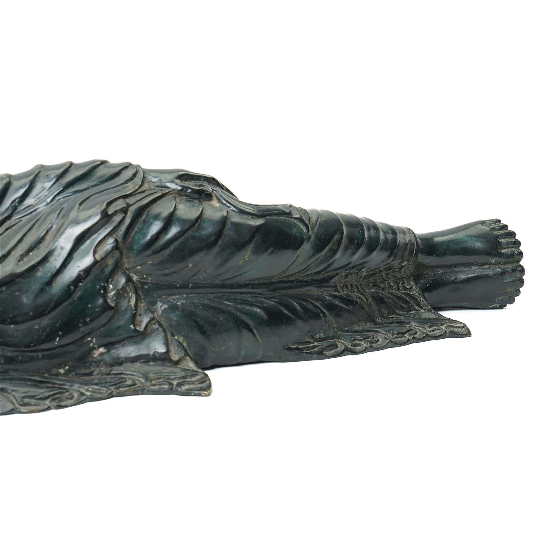 Late 20th century bronzed figure of a reclining buddha L64cm
