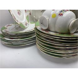 Paragon Rockingham pattern part tea and dinner service including three teapots, milk jug, cups and saucers of various sizes, ten soup bowls, ten side plates, ten dinner plates etc (96)