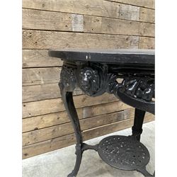 Cast iron Britannia circular pub table, and two pedestal cast iron bases (3)