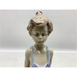 Three Lladro figures comprising, Pocket Full of Wishes no 7650, School Days no 7604 and Spring Bouquets no 7603, all with original boxes, largest example H26cm  