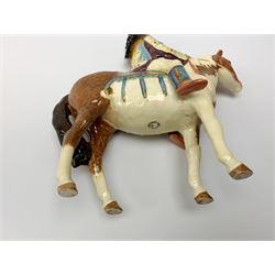 A Beswick Native American on horseback, with printed mark beneath, H21.5cm. 