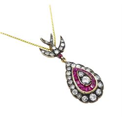 Gold and gold-plated diamond and ruby pendant necklace, the pear shaped pendant, milgrain set with round brilliant cut and single cut diamonds and calibre cut rubies, suspending from a ruby and diamond swallow bail, on a silver-gilt chain, total ruby weight 0.35 carat, total diamond weight 0.60 carat, with World Gemological Institute Report 