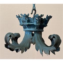 19th century iron pendent light fitting, with floral cast ceiling rose above castellated b...