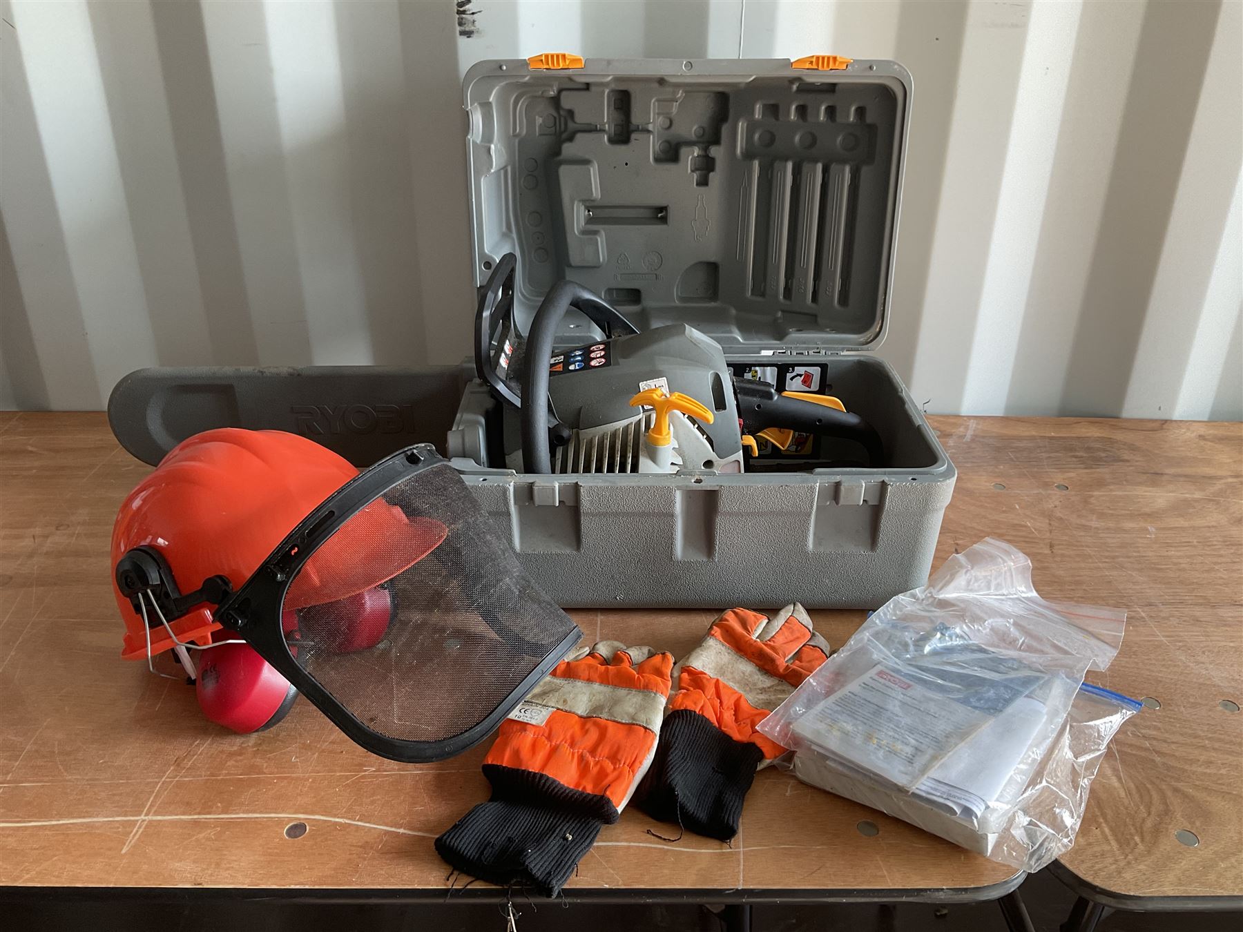 Ryobi petrol chainsaw with helmet, face shield and gloves - THIS LOT IS TO BE COLLECTED BY APPOINTMENT FROM DUGGLEBY STORAGE, GREAT HILL, EASTFIELD, SCARBOROUGH, YO11 3TX