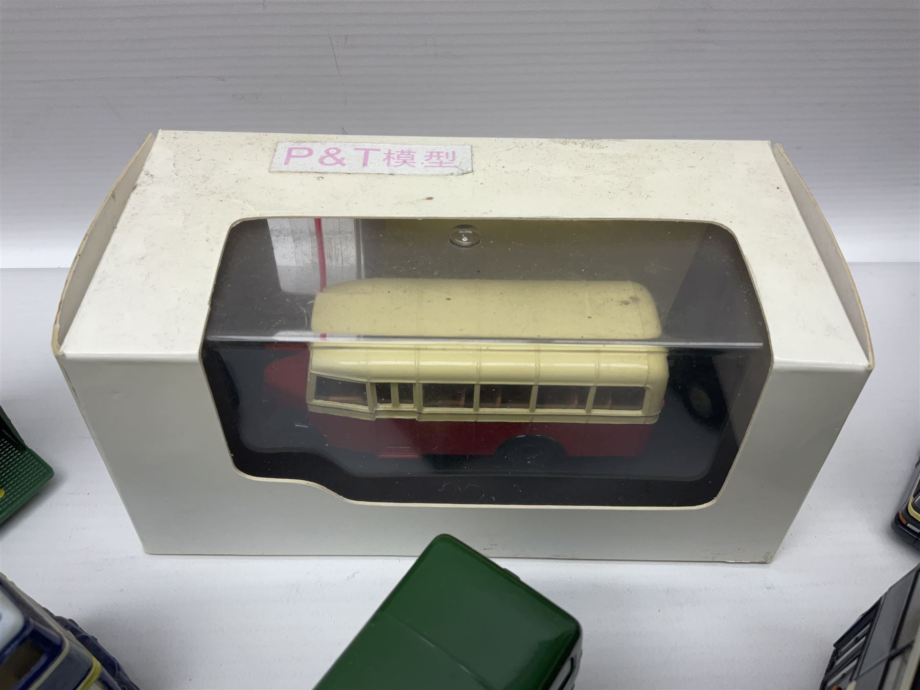 Thirty-one modern die-cast models of buses, coaches and trams by Corgi, EFE, Solido etc; predominantly unboxed but one in box