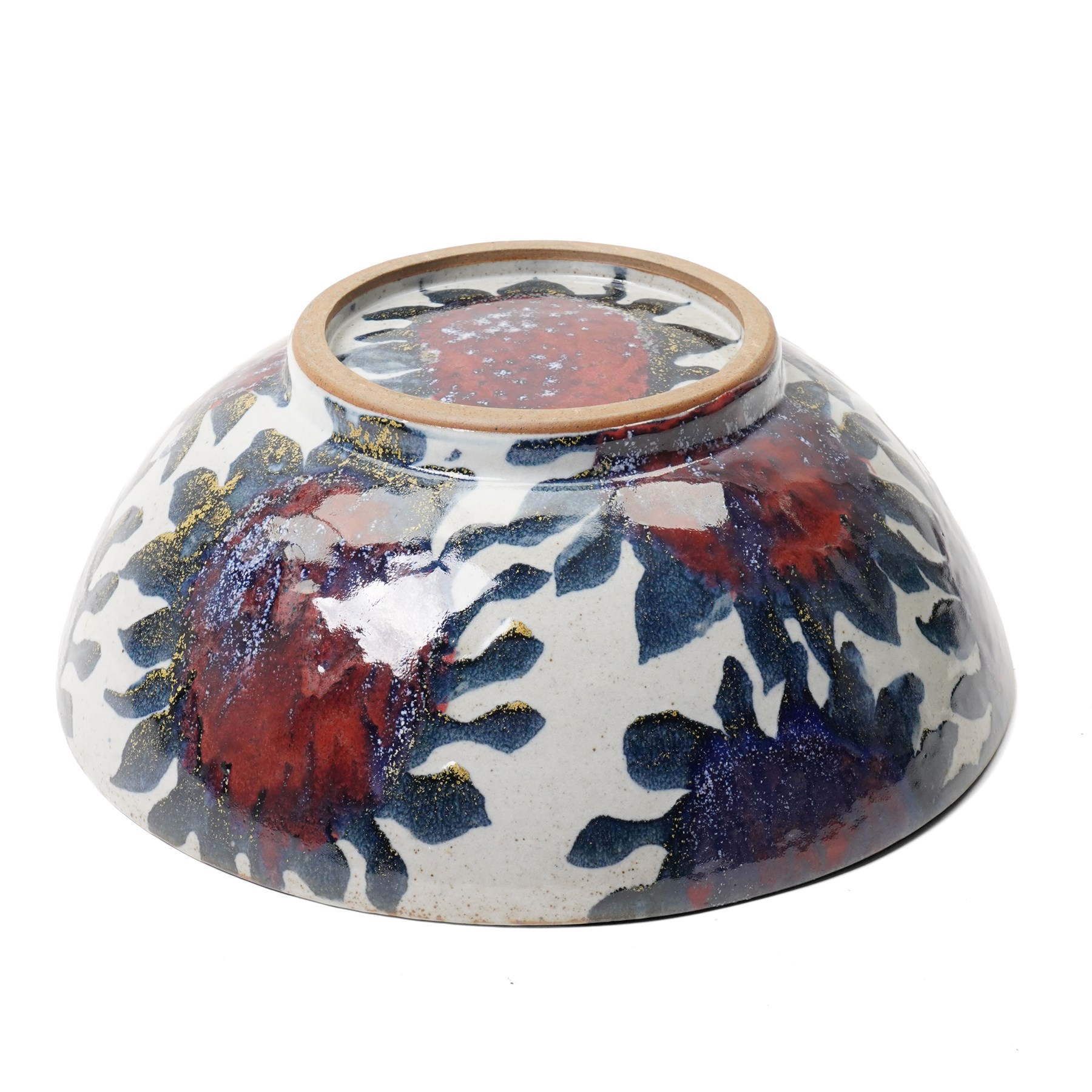 Sophie Hamilton (1963-): Sunflower bowl, decorated with blue and red sunflowers on a pale ground, unmarked, D34cm