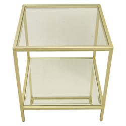Modern pair of brass finish and glass bedside stands, each of square form with clear glass top, glazed sides and mirrored under tier, enclosed by a square section brass finish metal frame, raised on short square supports