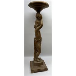 Italian carved lime wood torchère, the column modelled as a putto with arms raised supporting a circular top, upon a square stepped base, H92cm top D27cm 
