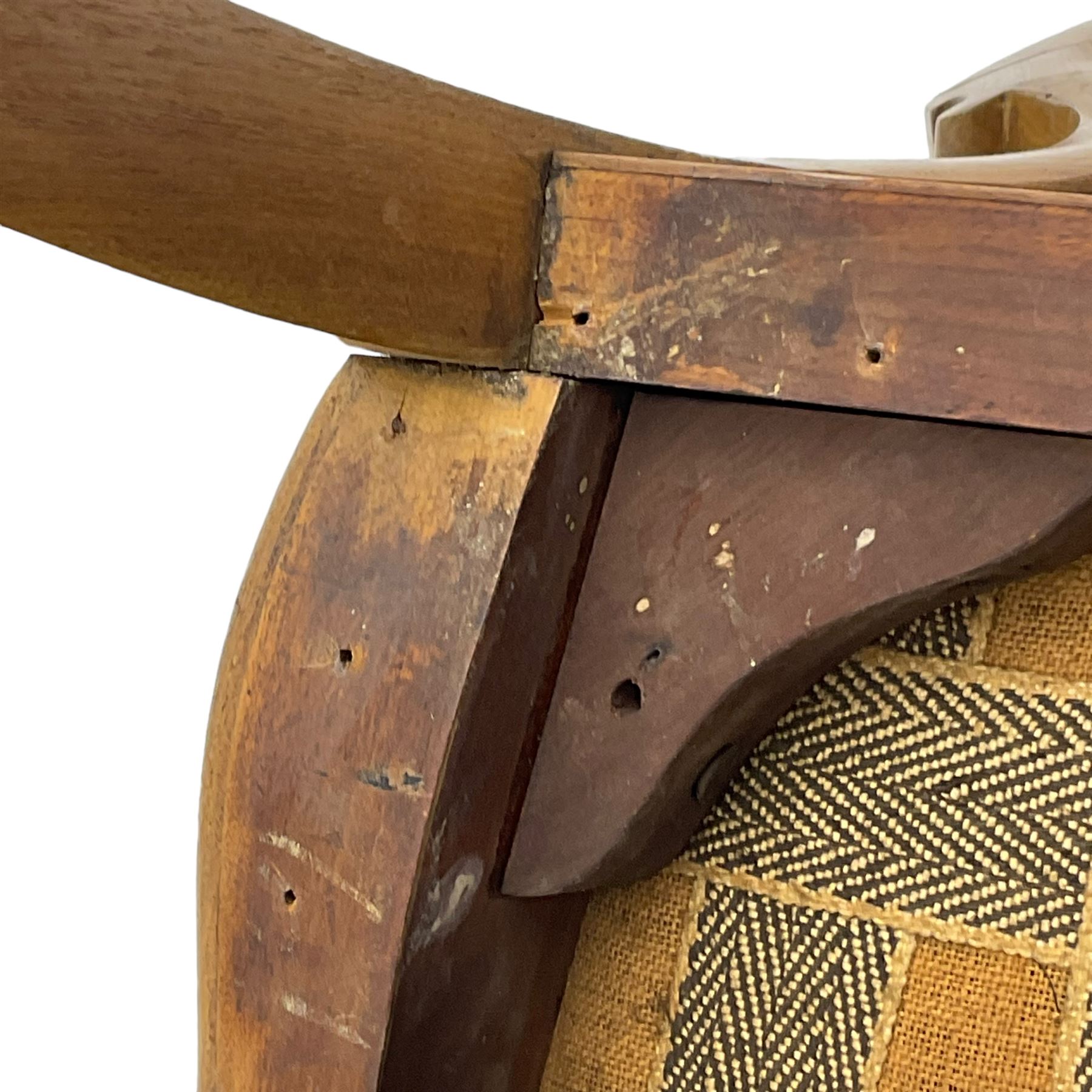 Pair of Victorian walnut side chairs, shaped cresting rail carved with acanthus leaves, overstuffed upholstered seats with stud band, on cabriole supports with scroll carved terminals