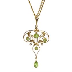 Edwardian gold peridot and seed pearl pendant, stamped 15ct, on later 9ct gold flattened curb link chain necklace