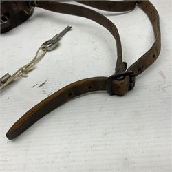 Metal cased drum shaped travelling clock with grey hammered finish, French clockwork movement and stitched leather outer case with shoulder strap; bears manuscript label 'Royal Armament Research and Development Establishment - serial no.09433' D13cm overall