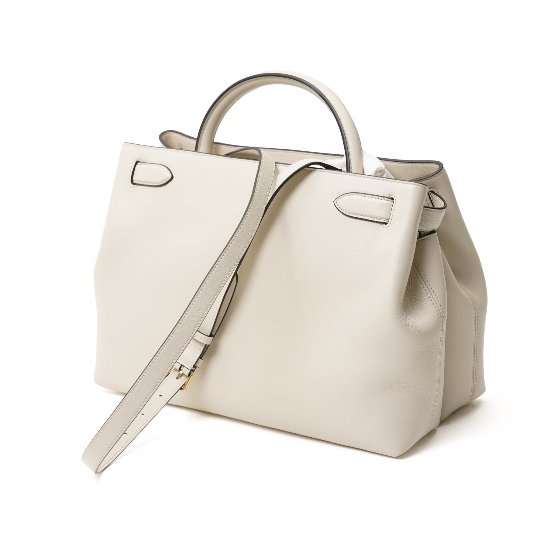 Mulberry - Islington handbag in Chalk Silky Calf leather with black piping, the structured body with single rolled top handle, gold-tone Postman’s Lock fastening and front strap detail, with detachable and adjustable shoulder strap, opening to a spacious two-division interior with Mulberry monogram fabric lining, with original Mulberry product tag, care booklet and dust bag, unused