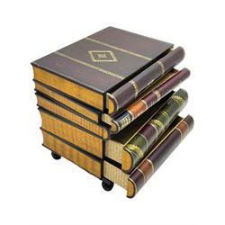 Maitland-Smith - four drawer chest in the form of a stack of leather-bound books, the top drawer with metal label inscribed 'Maitland-Smith', on turned feet