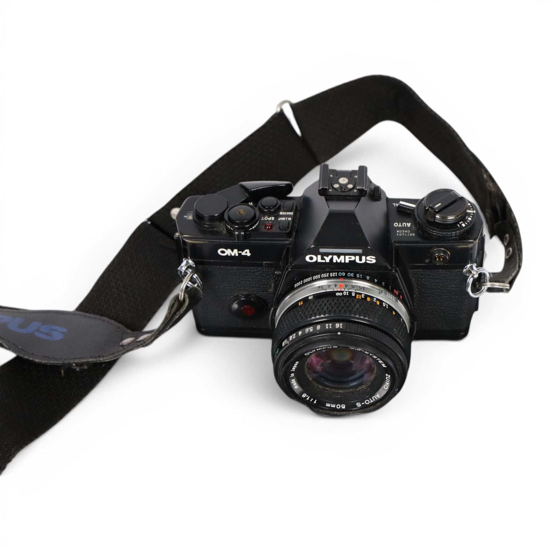 Olympus OM4 camera body, serial no. 1018238, with an Olympus OM-System Zuiko Auto-S 50mm 1:1.8 lens