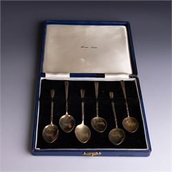 Set of six mid 20th century silver-gilt and guilloche enamel coffee spoons, the undersides...
