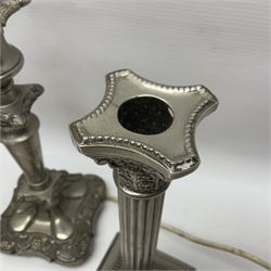 Pair of Corinthian column candlesticks, and a silver plated lamp, candlesticks H26cm