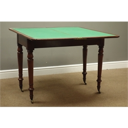  Victorian mahogany card table, moulded rectangular top with rounded corners, baize lined playing surface, on turned supports with brass castors, W100cm, H75cm, D49cm  