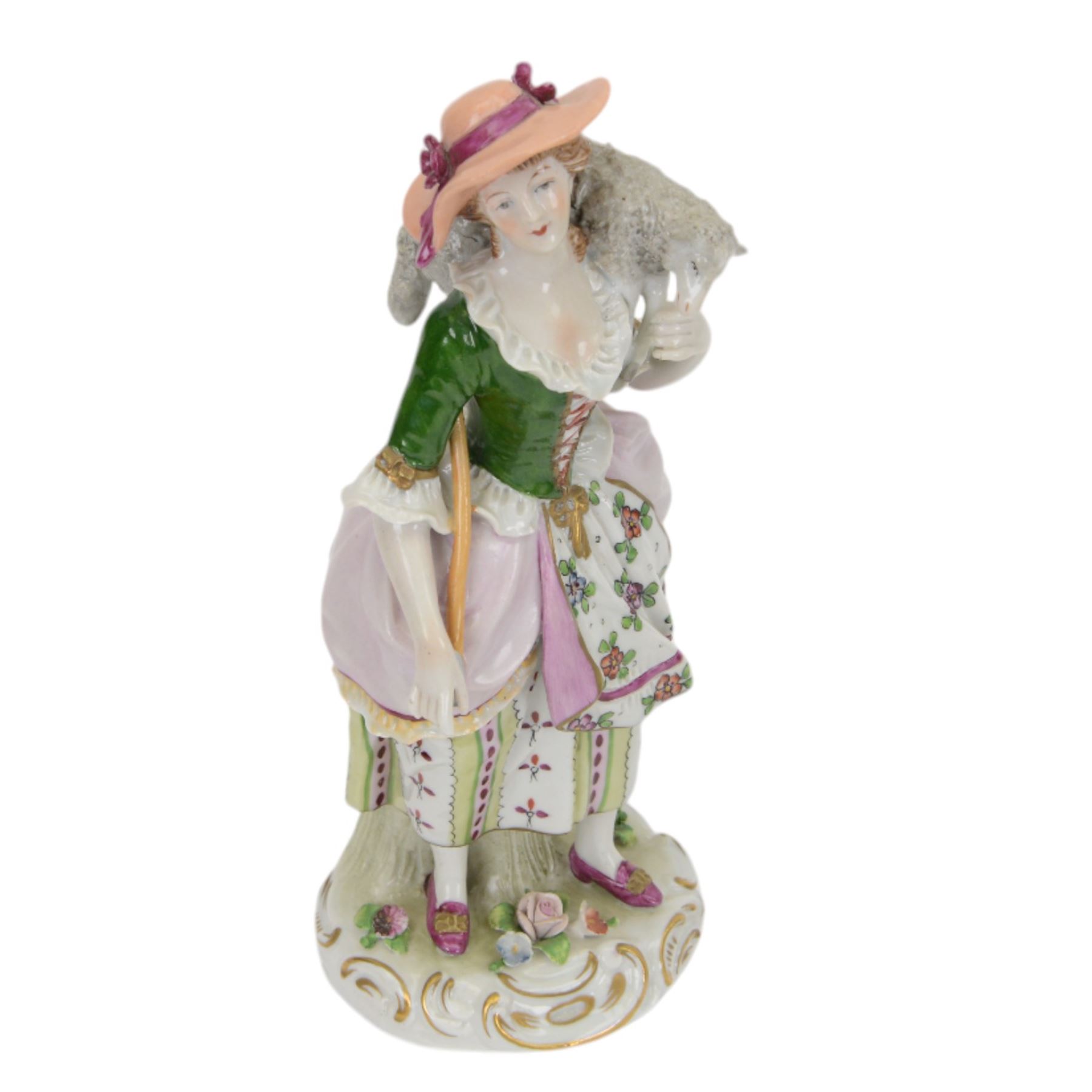 Sitzendorf figure modelled as a shepherdess, together with pair of apple sellers and other continental figures