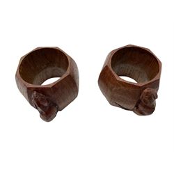 Mouseman - pair of oak napkin rings, of bulbous octagonal form each carved with mouse signature, by the workshop of Robert Thompson, Kilburn, L4cm W6cm