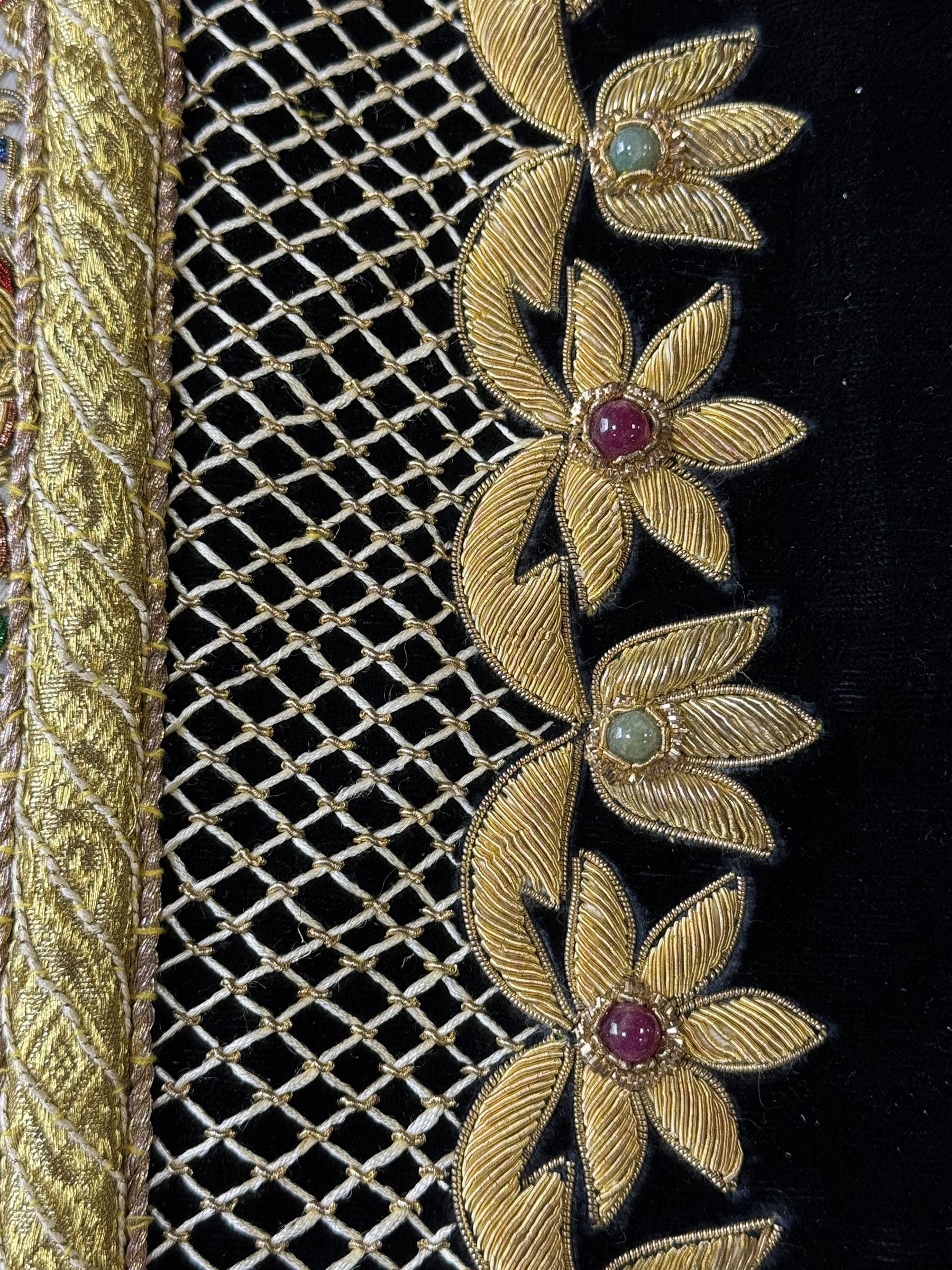 20th century large Zardozi wall hanging, hand embroidered in gold thread on black velvet ground with semi-precious stones and central medallion  149x93cm