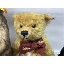 Seven modern Steiff teddy bears comprising two limited edition '1908 Paul the Growler' bears Nos.1124/3000 and 1310/3000; 028649 Classic Teddybear 23; 005992 Classic Teddybear 28 (black); 071249 Mungo Meerkat 30; 079139 Reclining dog for American Kennel Club; and 029561 Petsy gespitzt (1928) 16cm; together with a Mrs. McCatty's limited edition 2156 Sophie bear No.1557/1750; all unboxed but most with labels (8)
