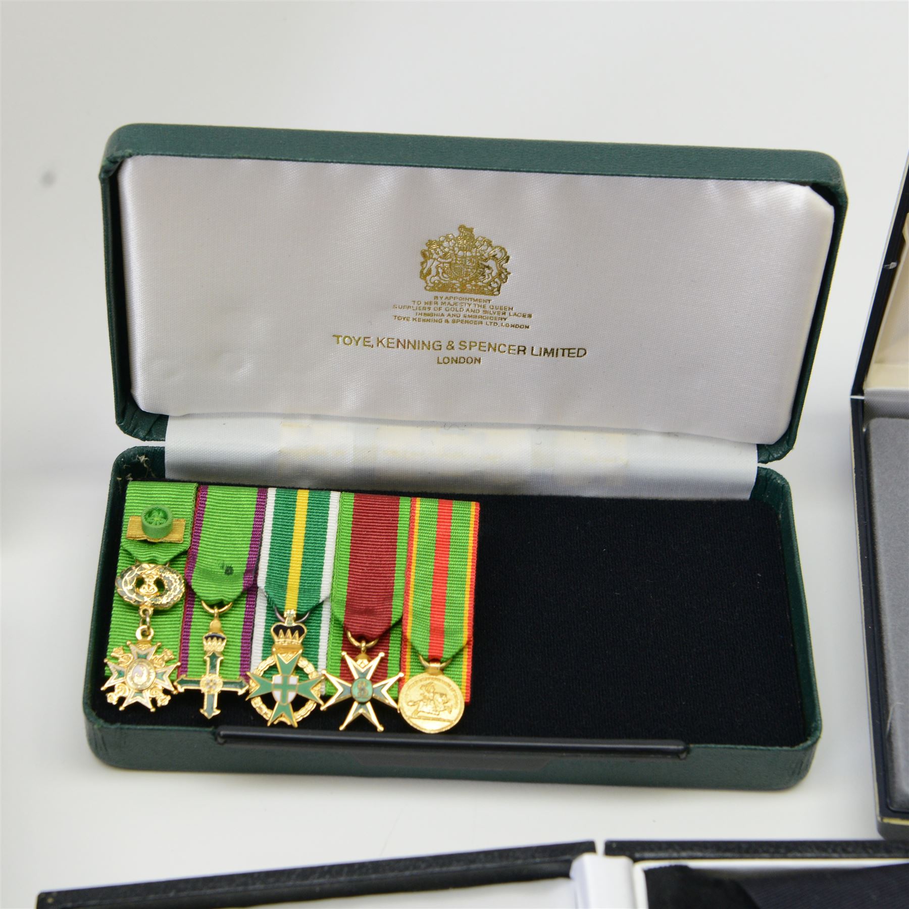 Collection of medals, insignias and minitures, including American National Defence medals, Efficiency Decoration medal, Order of St. John of Jerusalem stars, Military and Hospitaller Order of St. Lazarus of Jerusalem medals etc, several by Toye, Kedding & Spencer Ltd and Worcestershire Medal Service Ltd