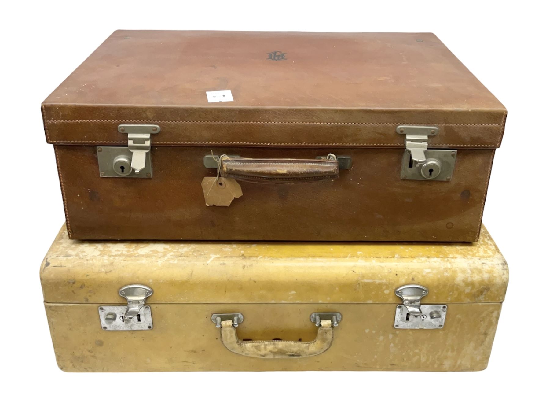 Vintage leather traveling case with monogram to cover, with watered silk lining to interior, and some contents, plus a further vintage travel case, (2)