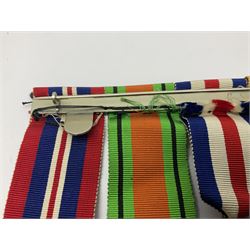 WWII group of five medals comprising 1939-45 War Medal, Defence Medal, 1939-45 Star, Africa Star and France and Germany Star on wearing bar; WWI British War Medal awarded to 142019 Pte. A. Thompson A.S.C.; and boxed King's Badge 'For Loyal Service'