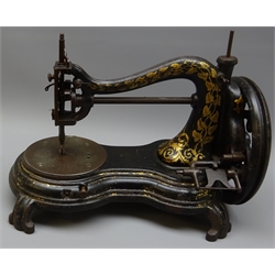  Late 19th century Jones hand Sewing machine, serpentine cast iron body with gilt scroll & leaf detail, L34cm, H25cm   