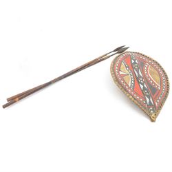 Maasai shield, made of hide, with white, red and black pigment decoration, the back attach...