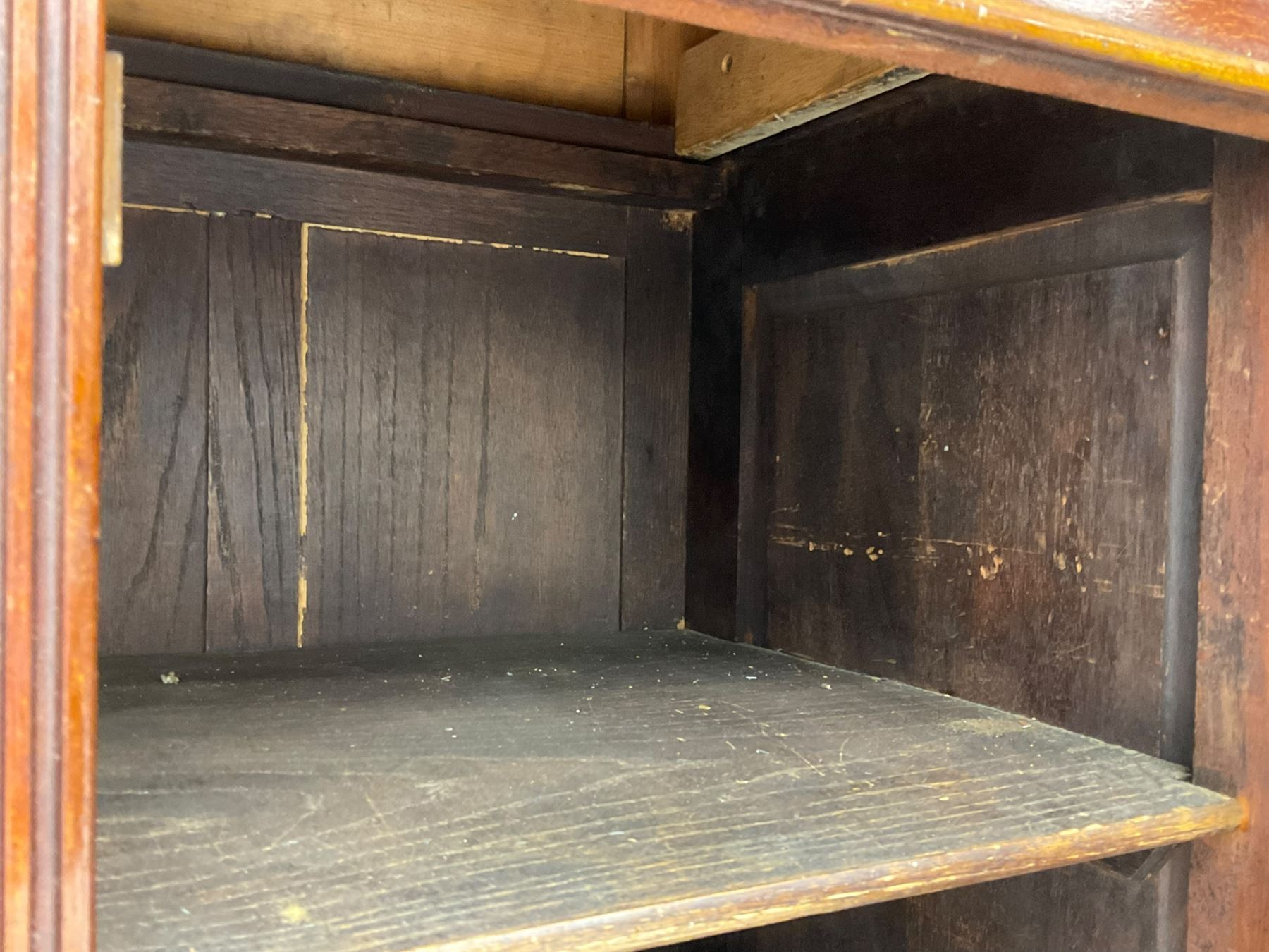 The Shannon Limited - late Victorian walnut filing cabinet, fitted with twenty-four small filing drawers, each with brass handle with label holder, fluted uprights, double cupboard below enclosed by two panelled doors, on turned feet, with brass plaque inscribed 'The Shannon, Limited, Ropemaker St. London, E.C.'