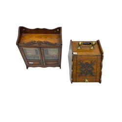 Edwardian oak smokers cabinet, broken swans neck pediment, two bevelled glazed and panelled doors enclosing four small drawers and pigeon hole (W42cm H45cm); Edwardian oak coal scuttle, carved fall-front with brass handles (W32cm H37cm)