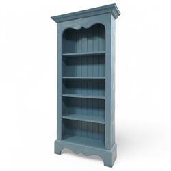 Painted pine open bookcase, projecting cornice over four adjustable shelves, in blue paint finish 