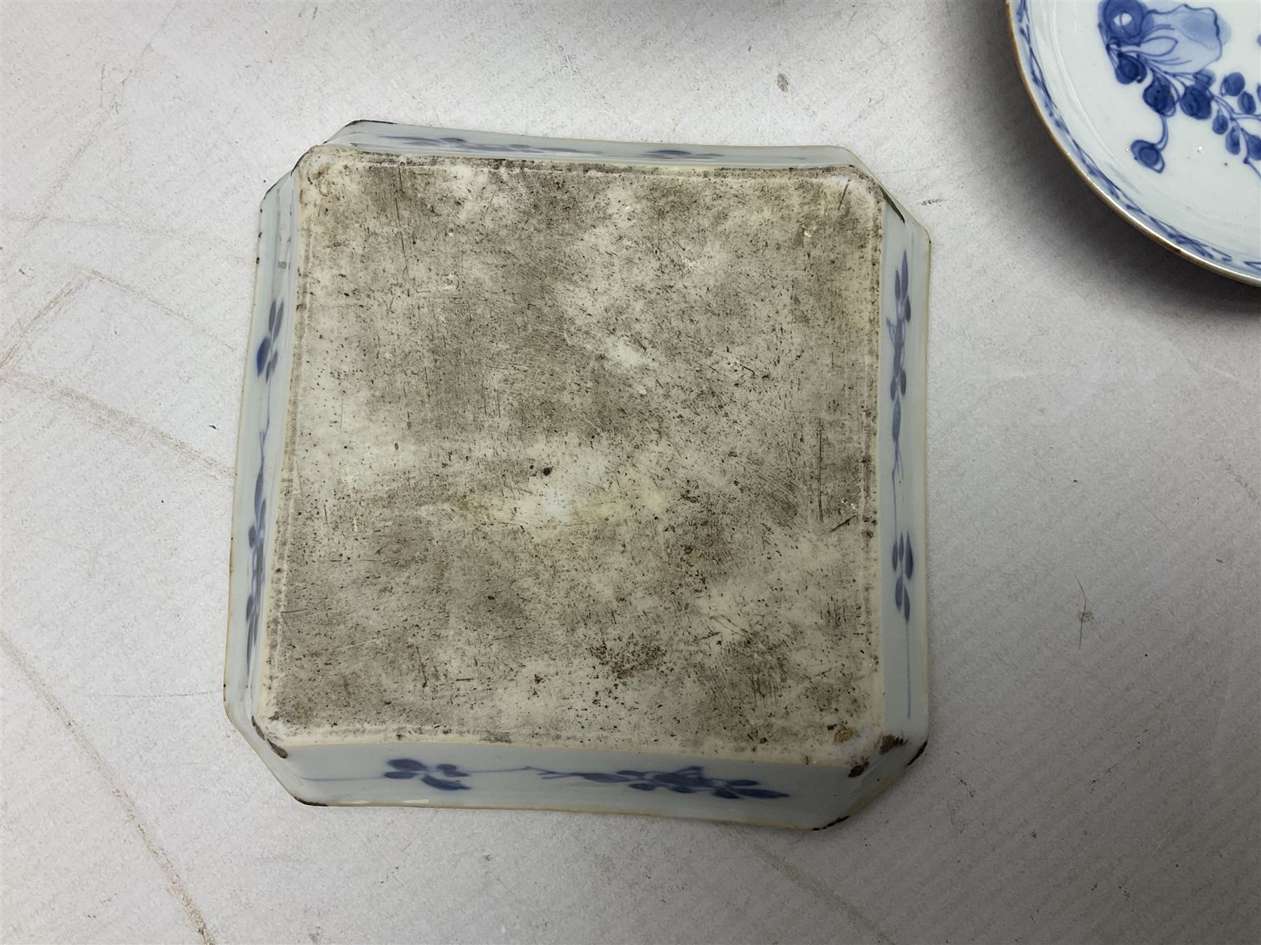 19th Century Imari pattern Japanese blood letting bowl, together with 19th century chinese blue and white square dish with decorated with blossoming flowers, together with thee blue and white saucers 
