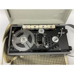 John Lennon interview recording conducted by John Hill student of Hull University on the 16th October 1964 at the A.B.C. Theatre Hull on behalf of the university newspaper 'Torchlight'. The interview lasts eight and a half minutes. It catches John in an upbeat breezy mood answering questions about the following topics: the song writing process ('sometimes you get an idea ....I dunno....my left leg.... and then write about that....'), recording (.... 'they just say - you're recording on such and such a date and they hope we turn up with some good songs written ....'), an alternative career path (.... 'I'd probably just have been a lay-about....'), failing at college (....'some other lads did my exams for me ....'), reading matter ( Clockwork Orange, Alice in Wonderland), his books of prose, tastes in music, the Blues, The Rolling Stones, being a Beatle vis-a-vis anonymity ('Whatever I'd be I'd choose to be rich .... who wants to walk down the street?').
The interview was recorded on 1/4 inch Emitape on a Fi-Cord Fidelity Recording machine. The reel-to-reel tape comes in its original Emitape plastic box and is accompanied by the Fi-Cord reel-to-reel machine on which the interview was originally recorded. Also included in this lot are a copy of the 'Torchlight' newspaper from 21st November 1964, two photographs of the interviewer with John Lennon (the interviewer is pictured to the left of John Lennon in the photograph in which John is signing a sketch) and one photograph of Paul McCartney with another reporter, the largest measures 12 x 16.5cm and a transcript of the interview. The recording is also accompanied by the original Fi-Cord tape recorder with microphone, four original 2v batteries and battery charger. The tape recorder has been adapted to take 3xAA batteries and the 2v battery charger is fitted with a standard UK 3-pin AC plug. The interview was recorded in the press room prior to the Beatles concert at the A.B.C. Theatre and is sold with copyright.