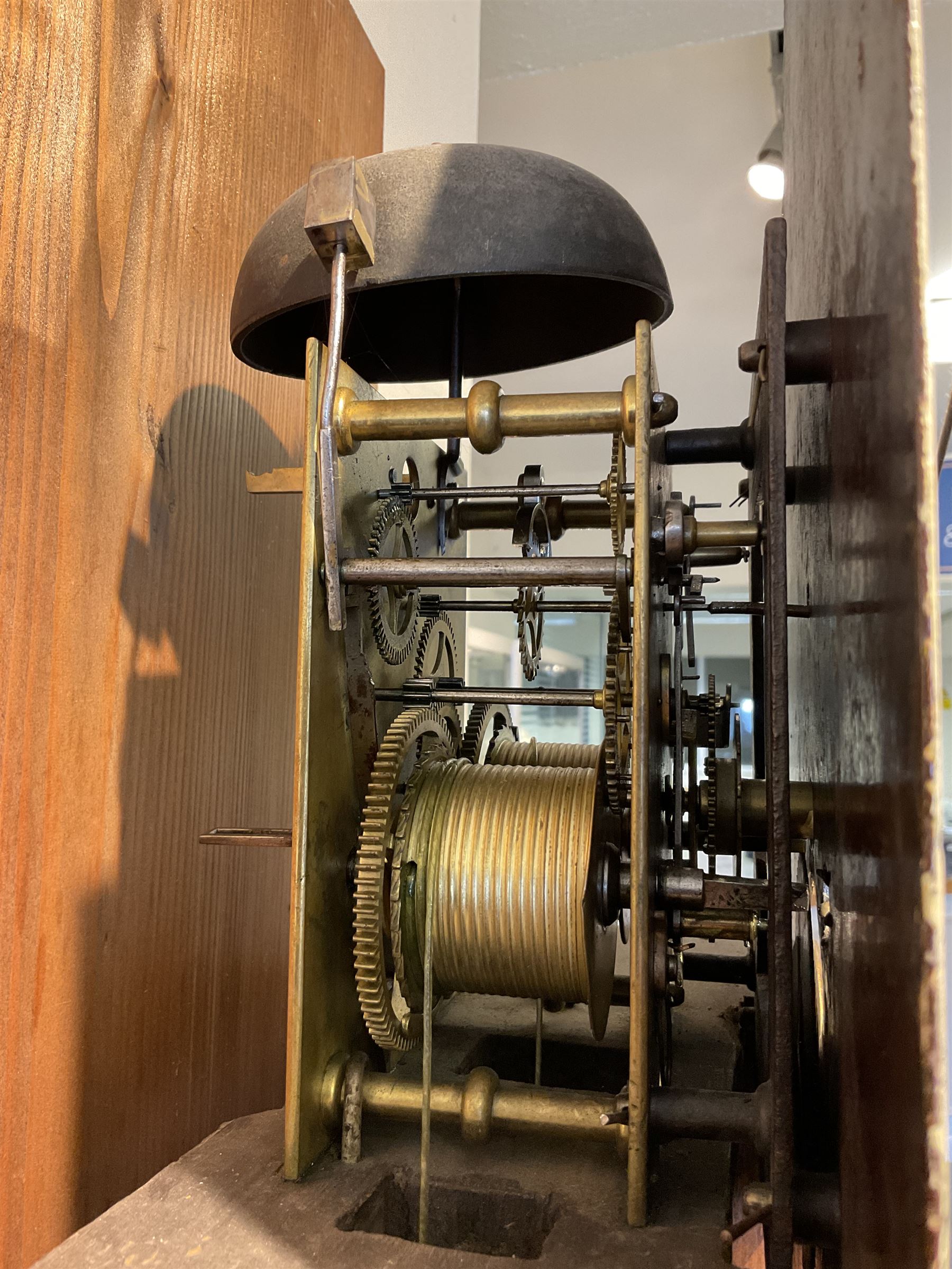 John Sculcoates Branson of Hull - Oak cased 8-day longcase clock c1790, with an inlaid perogda pediment and three ball and spire finials, breakarch hood door beneath flanked by reeded pilasters and brass capitals, long trunk with conforming door on a rectangular plinth raised on a base with bracket feet, early painted dial with raised gesso spandrels, swag cartouche and makers name to the arch, with pierced steel hands, Roman numerals,five minute arabics, seconds dial and calendar aperture, dial pinned via a false plate to a rack striking movement with a recoil anchor escapement. With weights, pendulum and key.