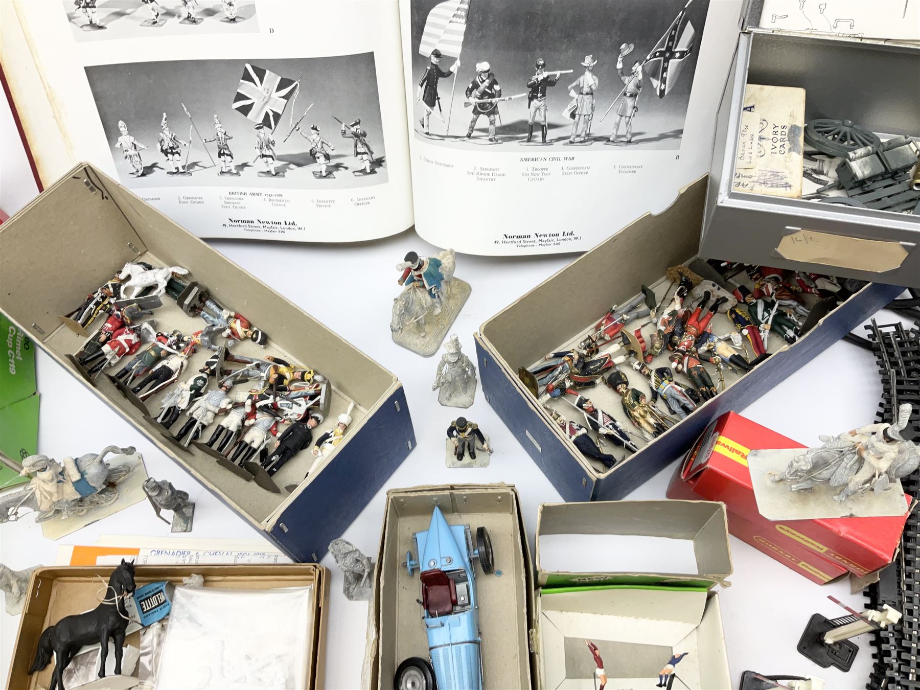 Fifty modern lead figures of mounted and foot soldiers, various period uniforms from 18th century to WW2, painted and unfinished with related paperwork; small quantity of Hornby '00' gauge model railway items and track; and four boxed Subbuteo teams etc