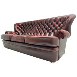 Wade - Georgian design three-seat sofa, high curved back over scrolled arms, upholstered in deep buttoned oxblood 'Pegasus' leather, on castors