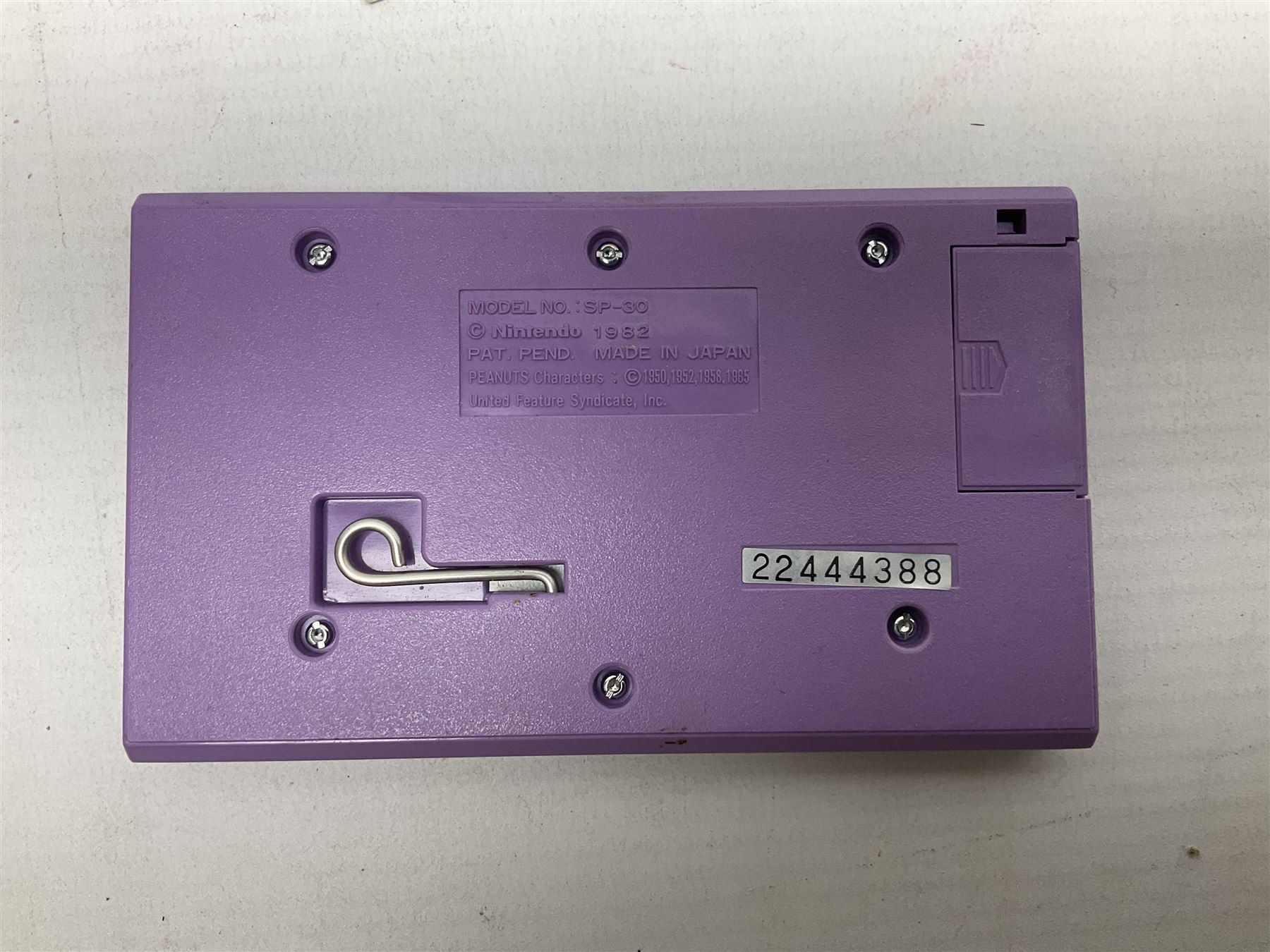 Collection of retro handheld games, including Nintendo Game & Watch ‘Snoopy Tennis’ (1982) and ‘Squish’ (1986) both with instruction booklets, Casio CG-600 ‘Star Invader’ with box, 3 in 1 LCD cartridge game including ‘Soccer’, ‘Invader’ and ‘Bomb Finder’ games, and two Grandstand ‘Pinball Wizard’ (1988) games, both with original boxes